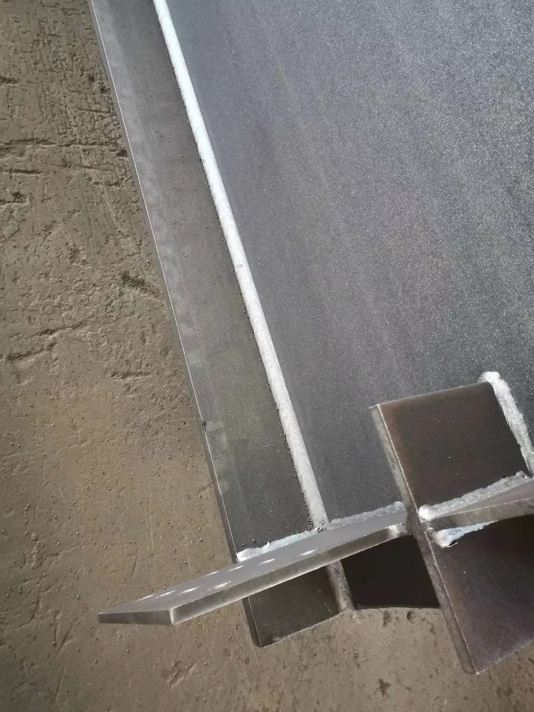 High-precision steel structure welding detail showing perfect seam integrity for steel building construction
