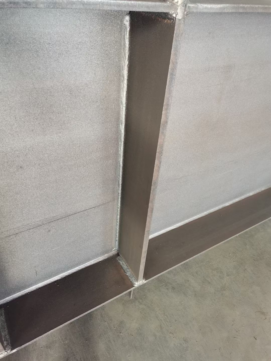 Close-up of premium steel structure welding seam demonstrating superior fusion quality for steel buildings