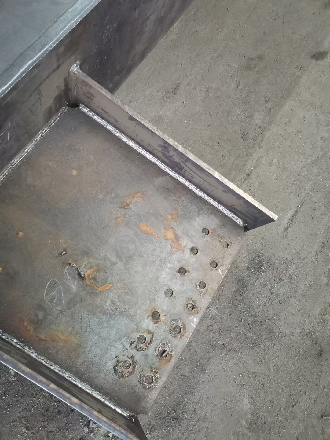 Engineered steel structure connection plate with precision-drilled bolt holes for maximum load distribution in steel buildings